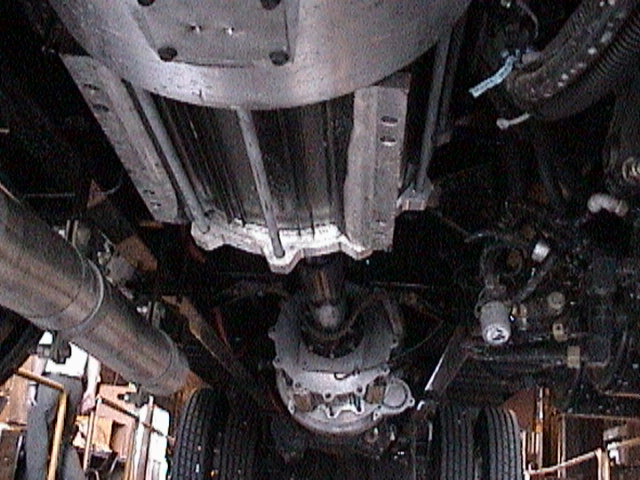 Underside looking aft showing two motors between engine and driveshaft.